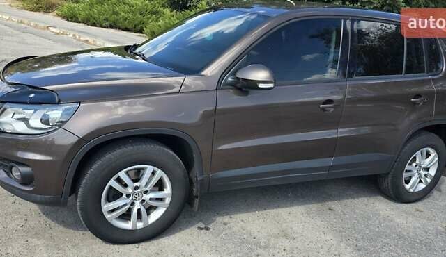 Коричневый Фольксваген Тигуан, объемом двигателя 1.97 л и пробегом 230 тыс. км за 13500 $, фото 2 на Automoto.ua