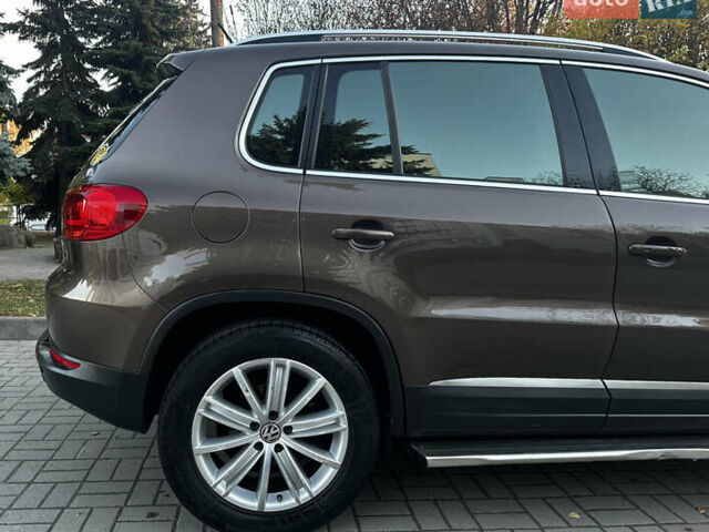 Коричневий Фольксваген Тігуан, об'ємом двигуна 2 л та пробігом 200 тис. км за 16650 $, фото 29 на Automoto.ua
