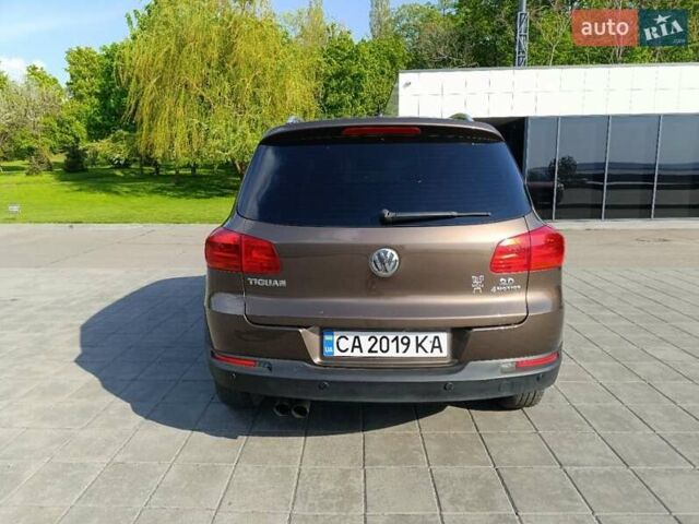 Коричневий Фольксваген Тігуан, об'ємом двигуна 2 л та пробігом 114 тис. км за 16900 $, фото 1 на Automoto.ua