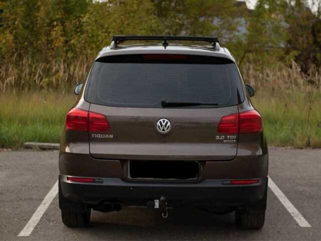 Коричневий Фольксваген Тігуан, об'ємом двигуна 2 л та пробігом 150 тис. км за 12700 $, фото 2 на Automoto.ua