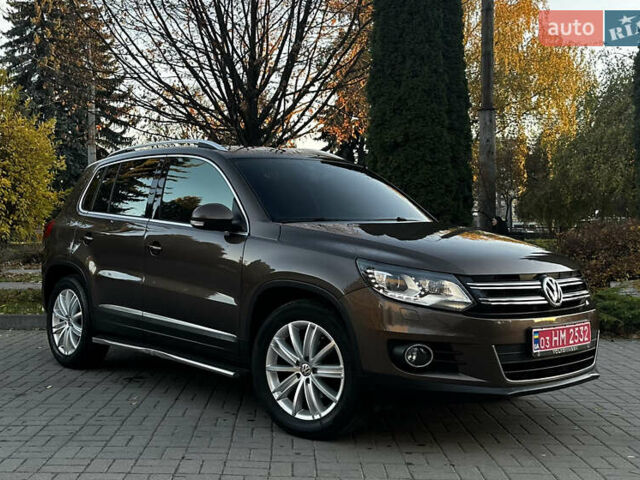Коричневий Фольксваген Тігуан, об'ємом двигуна 2 л та пробігом 200 тис. км за 16650 $, фото 1 на Automoto.ua