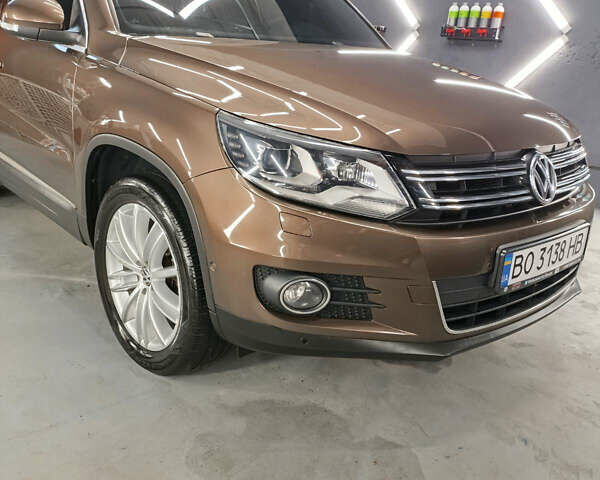 Коричневий Фольксваген Тігуан, об'ємом двигуна 2 л та пробігом 174 тис. км за 17700 $, фото 1 на Automoto.ua