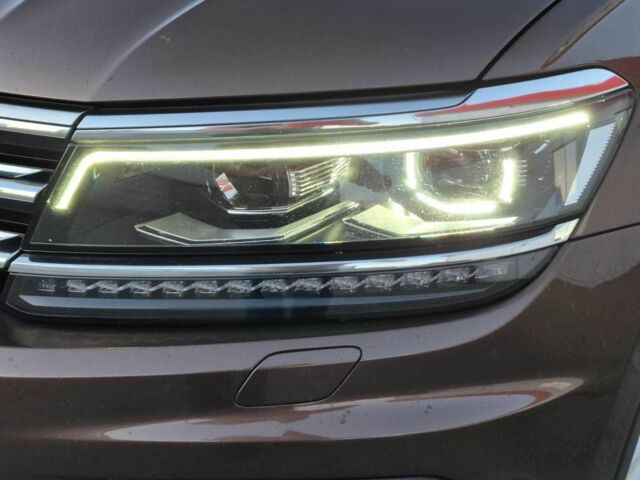 Коричневый Фольксваген Тигуан, объемом двигателя 2 л и пробегом 280 тыс. км за 22800 $, фото 1 на Automoto.ua