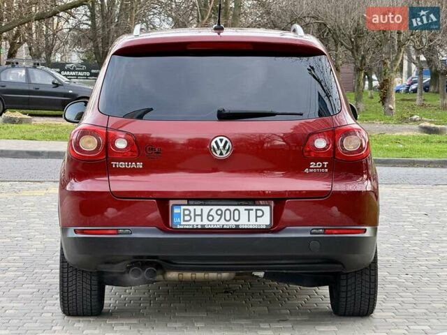 Красный Фольксваген Тигуан, объемом двигателя 2 л и пробегом 244 тыс. км за 8999 $, фото 6 на Automoto.ua