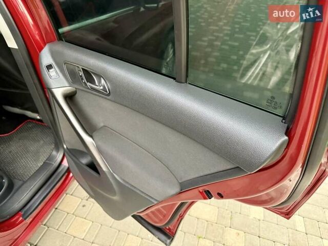 Красный Фольксваген Тигуан, объемом двигателя 2 л и пробегом 244 тыс. км за 8999 $, фото 56 на Automoto.ua