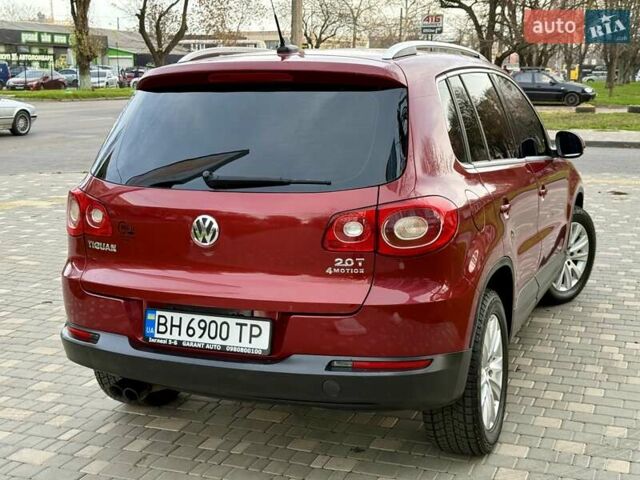 Красный Фольксваген Тигуан, объемом двигателя 2 л и пробегом 244 тыс. км за 8999 $, фото 18 на Automoto.ua
