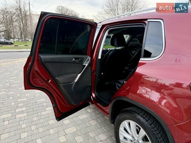 Красный Фольксваген Тигуан, объемом двигателя 2 л и пробегом 244 тыс. км за 8999 $, фото 23 на Automoto.ua