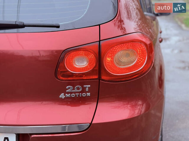 Червоний Фольксваген Тігуан, об'ємом двигуна 1.98 л та пробігом 218 тис. км за 8999 $, фото 27 на Automoto.ua