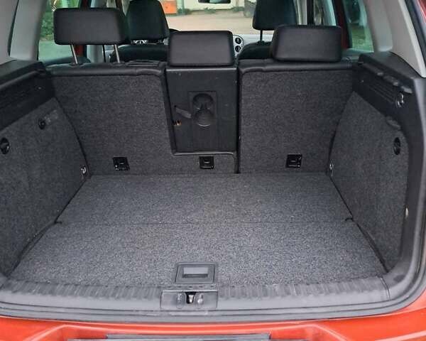 Красный Фольксваген Тигуан, объемом двигателя 1.98 л и пробегом 196 тыс. км за 9500 $, фото 19 на Automoto.ua