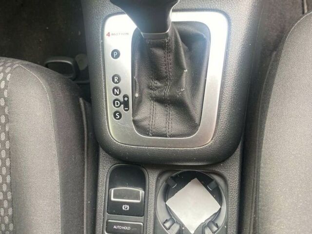 Красный Фольксваген Тигуан, объемом двигателя 2 л и пробегом 237 тыс. км за 9350 $, фото 7 на Automoto.ua