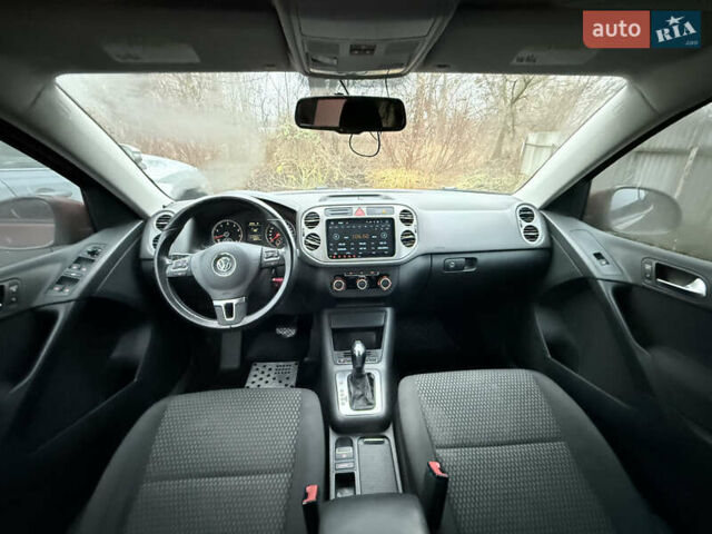 Червоний Фольксваген Тігуан, об'ємом двигуна 1.98 л та пробігом 218 тис. км за 8999 $, фото 46 на Automoto.ua