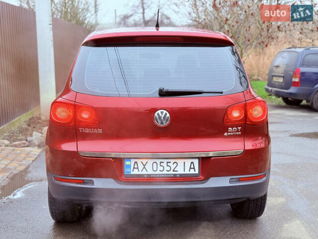 Червоний Фольксваген Тігуан, об'ємом двигуна 1.98 л та пробігом 218 тис. км за 8999 $, фото 26 на Automoto.ua
