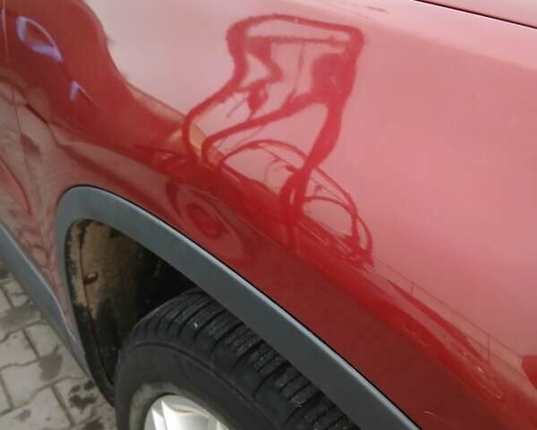 Красный Фольксваген Тигуан, объемом двигателя 2 л и пробегом 173 тыс. км за 12200 $, фото 8 на Automoto.ua