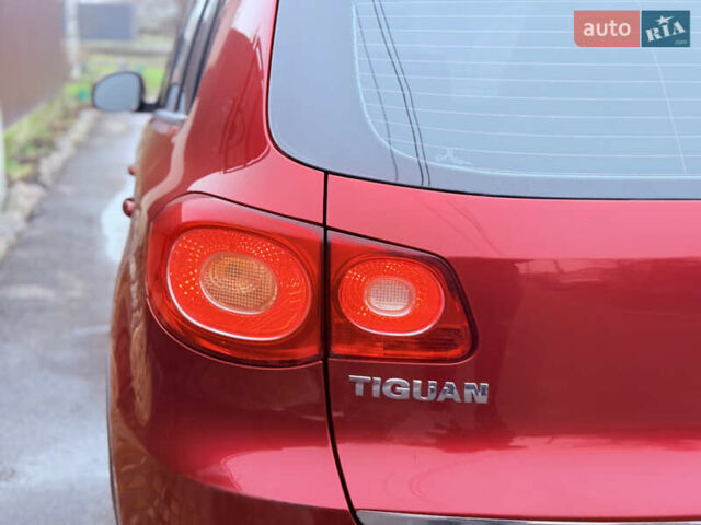 Червоний Фольксваген Тігуан, об'ємом двигуна 1.98 л та пробігом 218 тис. км за 8999 $, фото 28 на Automoto.ua