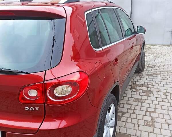 Красный Фольксваген Тигуан, объемом двигателя 1.98 л и пробегом 270 тыс. км за 9000 $, фото 1 на Automoto.ua