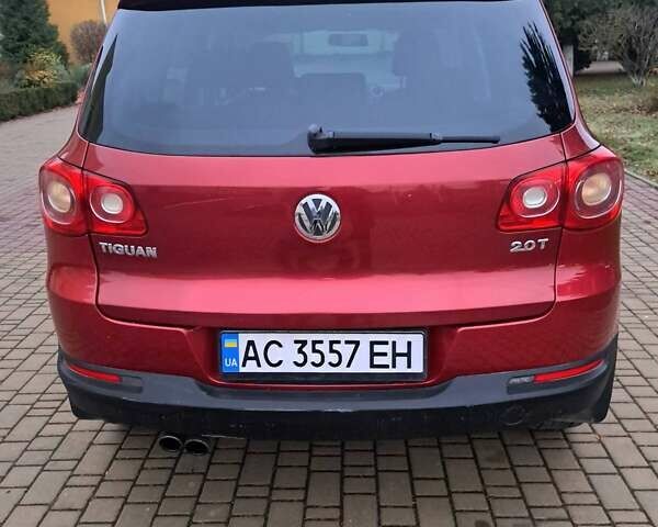 Красный Фольксваген Тигуан, объемом двигателя 1.98 л и пробегом 196 тыс. км за 9500 $, фото 10 на Automoto.ua