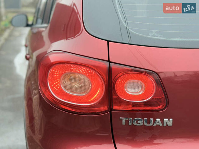 Червоний Фольксваген Тігуан, об'ємом двигуна 1.98 л та пробігом 218 тис. км за 8999 $, фото 30 на Automoto.ua