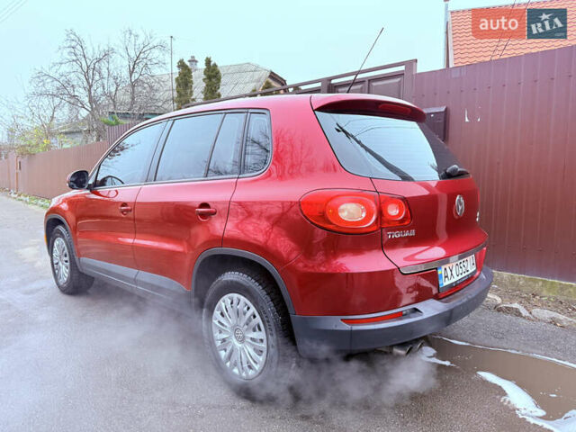 Червоний Фольксваген Тігуан, об'ємом двигуна 1.98 л та пробігом 218 тис. км за 8999 $, фото 10 на Automoto.ua