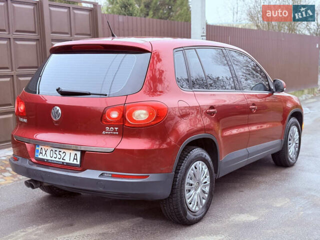 Червоний Фольксваген Тігуан, об'ємом двигуна 1.98 л та пробігом 218 тис. км за 8999 $, фото 29 на Automoto.ua