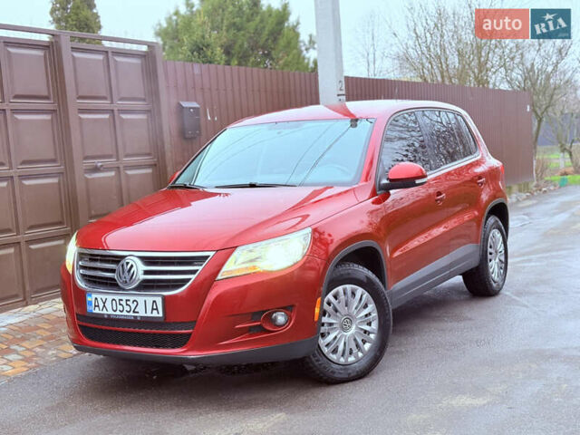Червоний Фольксваген Тігуан, об'ємом двигуна 1.98 л та пробігом 218 тис. км за 8999 $, фото 1 на Automoto.ua