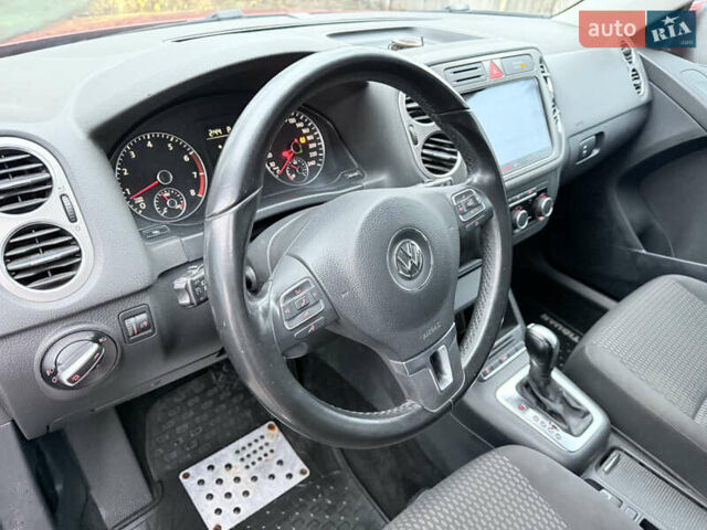Червоний Фольксваген Тігуан, об'ємом двигуна 1.98 л та пробігом 218 тис. км за 8999 $, фото 47 на Automoto.ua