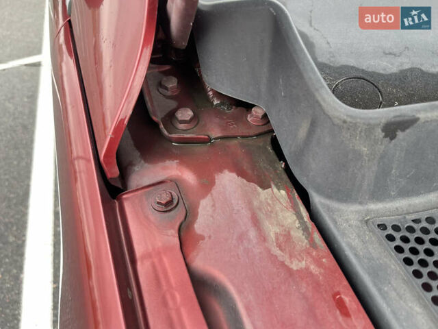 Червоний Фольксваген Тігуан, об'ємом двигуна 2 л та пробігом 232 тис. км за 10900 $, фото 20 на Automoto.ua