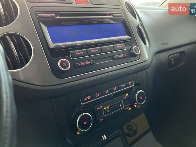 Красный Фольксваген Тигуан, объемом двигателя 2 л и пробегом 108 тыс. км за 12700 $, фото 20 на Automoto.ua