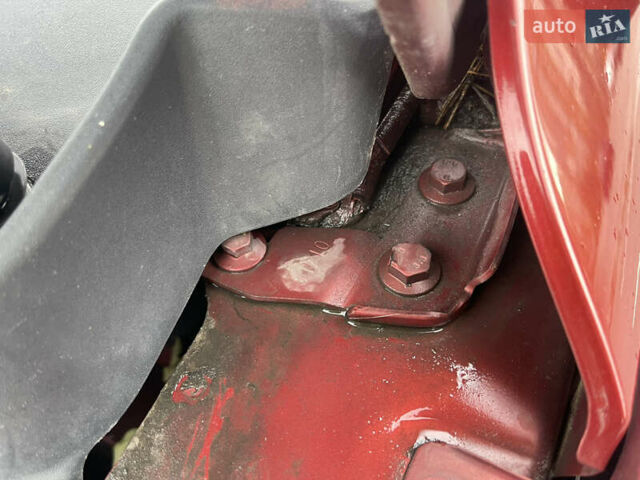 Червоний Фольксваген Тігуан, об'ємом двигуна 2 л та пробігом 232 тис. км за 10900 $, фото 21 на Automoto.ua