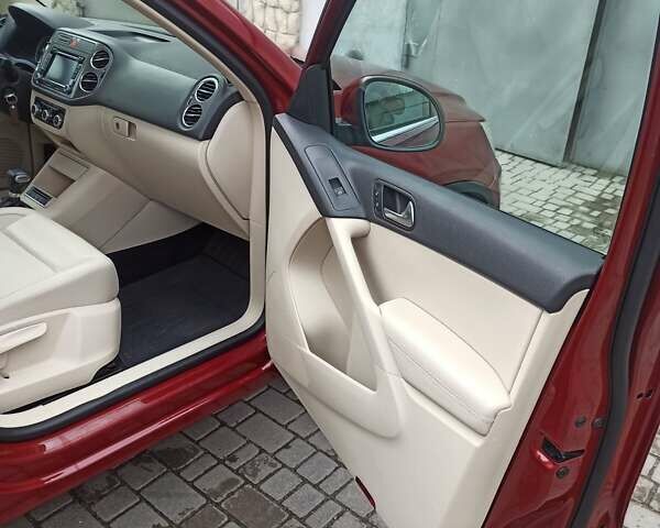 Красный Фольксваген Тигуан, объемом двигателя 1.98 л и пробегом 270 тыс. км за 9000 $, фото 14 на Automoto.ua