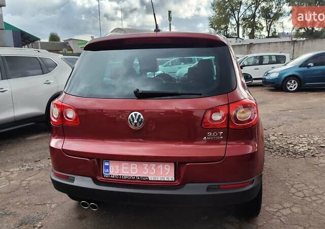 Красный Фольксваген Тигуан, объемом двигателя 2 л и пробегом 200 тыс. км за 10999 $, фото 5 на Automoto.ua