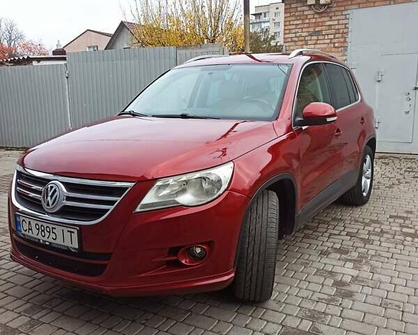 Красный Фольксваген Тигуан, объемом двигателя 1.98 л и пробегом 270 тыс. км за 9000 $, фото 7 на Automoto.ua