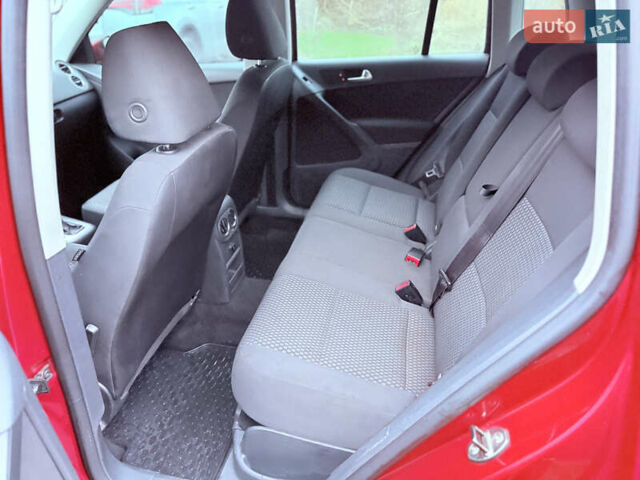 Червоний Фольксваген Тігуан, об'ємом двигуна 1.98 л та пробігом 218 тис. км за 8999 $, фото 18 на Automoto.ua