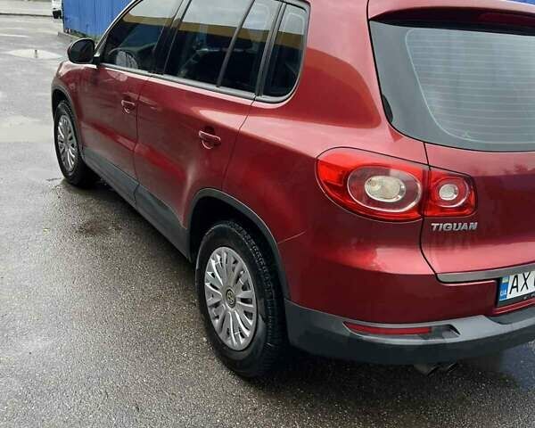 Красный Фольксваген Тигуан, объемом двигателя 1.98 л и пробегом 215 тыс. км за 10500 $, фото 5 на Automoto.ua