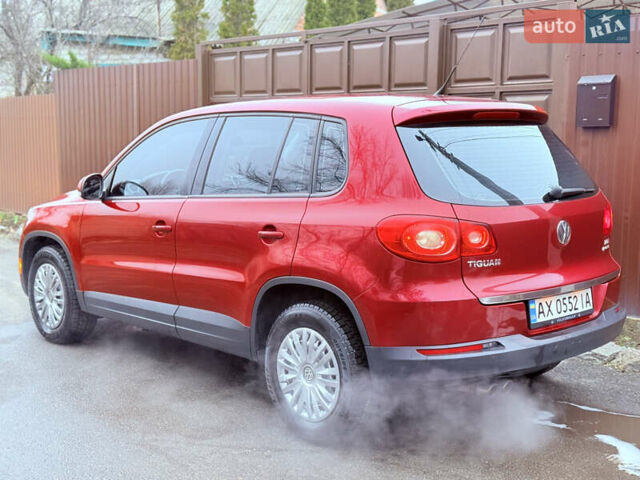Червоний Фольксваген Тігуан, об'ємом двигуна 1.98 л та пробігом 218 тис. км за 8999 $, фото 8 на Automoto.ua