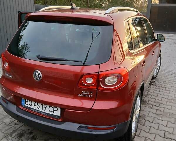 Красный Фольксваген Тигуан, объемом двигателя 2 л и пробегом 173 тыс. км за 12200 $, фото 2 на Automoto.ua