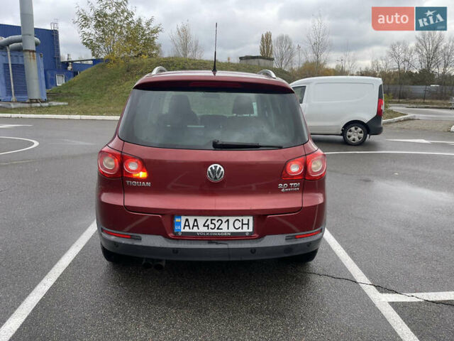 Червоний Фольксваген Тігуан, об'ємом двигуна 2 л та пробігом 232 тис. км за 10900 $, фото 5 на Automoto.ua