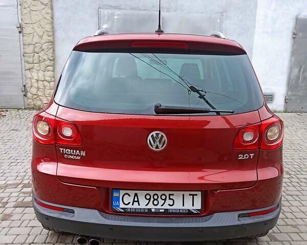 Красный Фольксваген Тигуан, объемом двигателя 1.98 л и пробегом 270 тыс. км за 9000 $, фото 6 на Automoto.ua