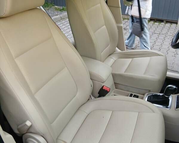 Красный Фольксваген Тигуан, объемом двигателя 2 л и пробегом 173 тыс. км за 12200 $, фото 12 на Automoto.ua