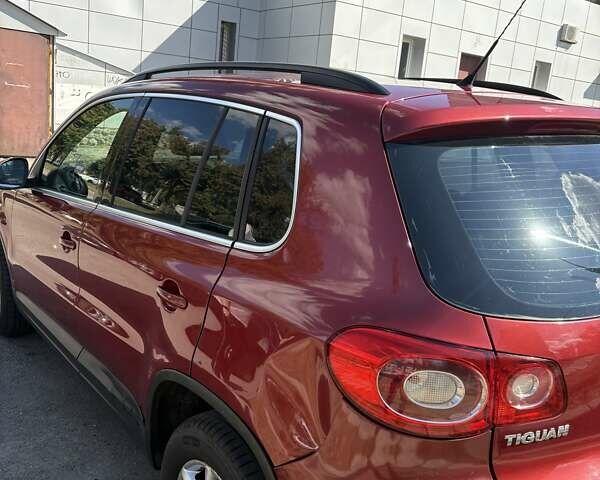 Красный Фольксваген Тигуан, объемом двигателя 1.4 л и пробегом 118 тыс. км за 11200 $, фото 6 на Automoto.ua