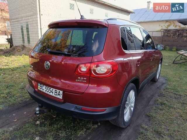 Красный Фольксваген Тигуан, объемом двигателя 1.98 л и пробегом 497 тыс. км за 9000 $, фото 9 на Automoto.ua
