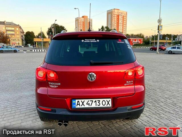 Красный Фольксваген Тигуан, объемом двигателя 2 л и пробегом 205 тыс. км за 13800 $, фото 5 на Automoto.ua
