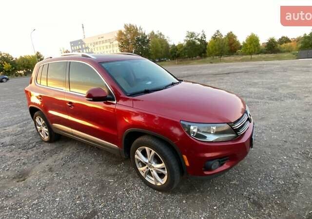 Красный Фольксваген Тигуан, объемом двигателя 1.98 л и пробегом 265 тыс. км за 10500 $, фото 5 на Automoto.ua