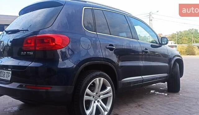 Червоний Фольксваген Тігуан, об'ємом двигуна 1.98 л та пробігом 182 тис. км за 12000 $, фото 2 на Automoto.ua