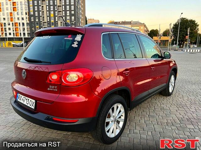 Красный Фольксваген Тигуан, объемом двигателя 2 л и пробегом 205 тыс. км за 13800 $, фото 6 на Automoto.ua
