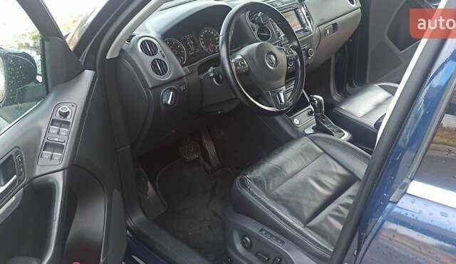 Червоний Фольксваген Тігуан, об'ємом двигуна 1.98 л та пробігом 182 тис. км за 12000 $, фото 10 на Automoto.ua