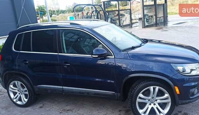 Червоний Фольксваген Тігуан, об'ємом двигуна 1.98 л та пробігом 182 тис. км за 12000 $, фото 3 на Automoto.ua