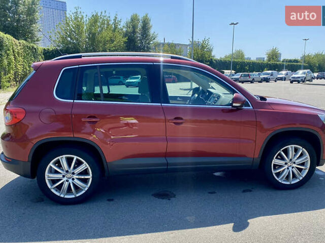 Красный Фольксваген Тигуан, объемом двигателя 1.98 л и пробегом 270 тыс. км за 10800 $, фото 4 на Automoto.ua