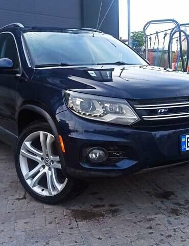 Червоний Фольксваген Тігуан, об'ємом двигуна 1.98 л та пробігом 182 тис. км за 12000 $, фото 8 на Automoto.ua