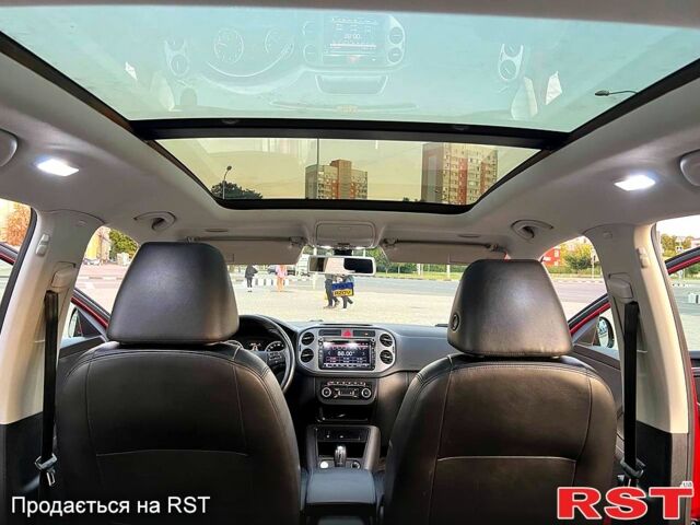 Красный Фольксваген Тигуан, объемом двигателя 2 л и пробегом 205 тыс. км за 13800 $, фото 12 на Automoto.ua