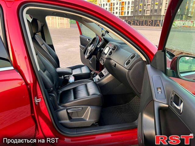 Красный Фольксваген Тигуан, объемом двигателя 2 л и пробегом 205 тыс. км за 13800 $, фото 8 на Automoto.ua